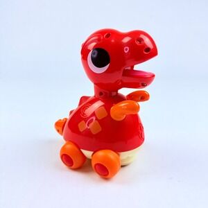 Huile Toys Red T-Rex Dinosaur Interactive Bump and Go Musical Toddler Toy